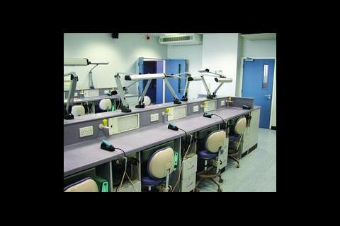 As well as providing downlighting, the semi-recessed light fittings introduce a wash effect across the ceilings. These are supplemented by task lighting at the workstations and benches.